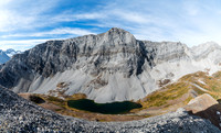 Gorgeous Invincible Lake with Hermione Ridge rising above and Hermione Peak on the far right. The bear is directly beneath us on the close side of the lake.