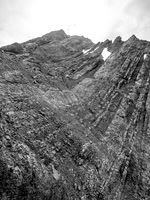 We ascended to the center of the main gully and then proceeded up and to the left, all the way to upper left before finding an easier access to the summit block.