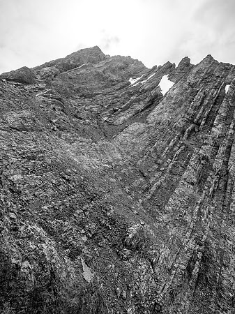 We ascended to the center of the main gully and then proceeded up and to the left, all the way to upper left before finding an easier access to the summit block.