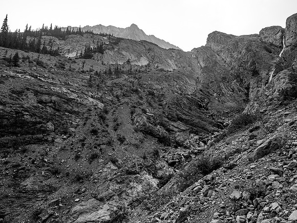 We have started up the right side of the creek (falls at right) but you can clearly see the two scree ramps at left that look very simple and also lead to the upper NW bowl.