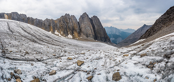 Looking back down the glacier from near the bottom of the scree access gully. Note the impressive cliff walls at left.