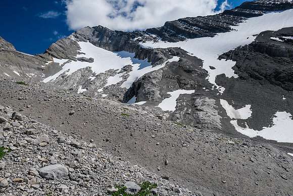 My route obvious up snow from lower right to the bench running to center top.
