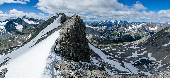The bench is technically easier than the ridge but horribly exposed to rockfall from the loose ridge