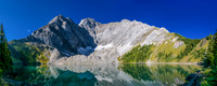 Mount Fox looms over Frozen Lake. The ascent ridge runs from the right side up to the left.
