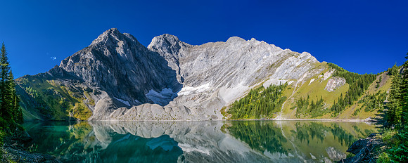 Mount Fox looms over Frozen Lake. The ascent ridge runs from the right side up to the left.