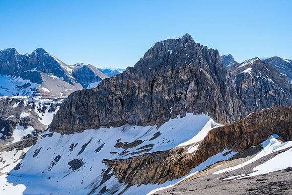 The Recondite Col above ours just under the triangular face - also exposed to cornices high above.