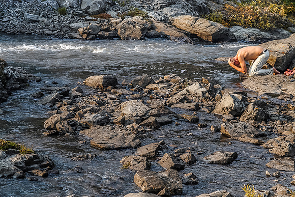 Jon cools off in Aster Creek after a long, hot day of scrambling and hiking.