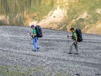 Rod and Vern are very glad to be hiking along the shoreline of Hidden Lake rather than bushwhacking around the east side of it.