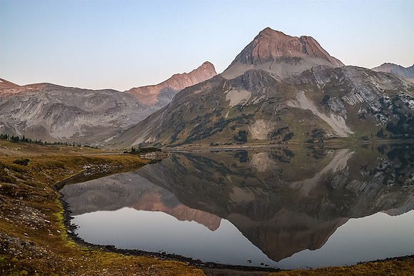 Northover and Lyautey reflect in Aster Lake.