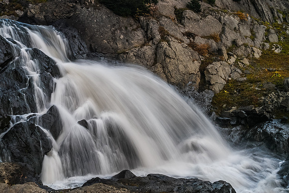 Relaxing at a waterfall along Aster Creek.