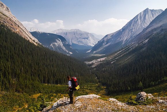 Jon takes in the views before our steep descent back into the forest along the valley floor.