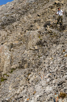 Jon descends more rubble towards the west side of the south ridge of Putnik.