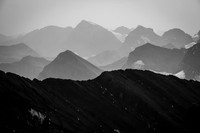 Mount Nivelle and the Castelnau Glacier are barely visible through the smoky haze. Other peaks around Nivelle include, McCuaig, De Gaulle, Castelnau and Ney.