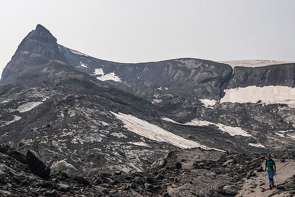 Rod and Kane's alternate descent route down the north gully rising left to the summit ridge of Cordonnier behind him.
