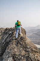 Rod navigates the narrow section of summit ridge where you can't afford to slip to either side!