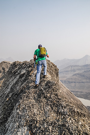 Rod navigates the narrow section of summit ridge where you can't afford to slip to either side!