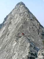 Vern delicately balances over an 'easy' section of the south ridge - compared to the crux anyway!
