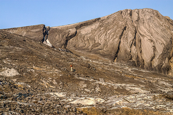 Jon grunts up to the scree ridge above the glacier - the summit visible above us here and the route via the skyline ridge.