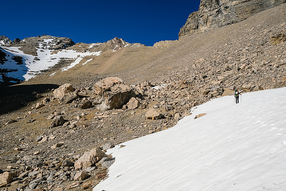 Hiking up loose shale and scree to the 2800m col at top center.