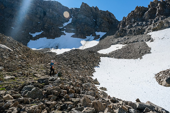 Descending the loose east side of Quartzite Col.