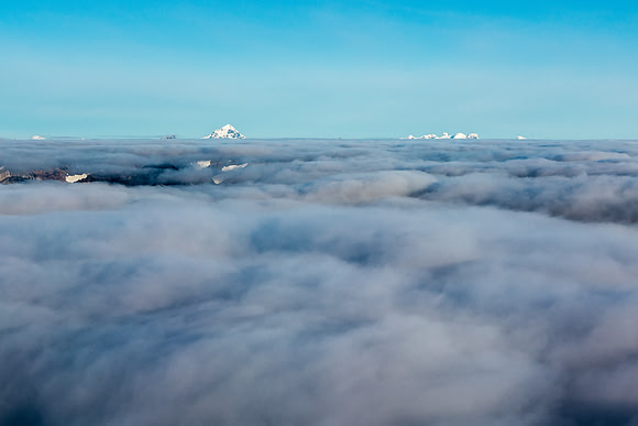 Forbes and the Lyells are the only summits above the clouds.
