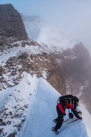 OK - this is no longer a 'simple scree hike'! With hard snow, glacier ice and fresh snow to spice up the rock, the south ridge didn't give up easily.