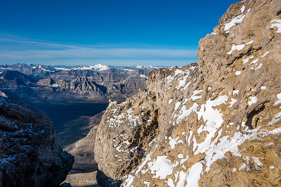 The rock around the crux is grippy but steep and snowy.