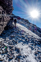 Heading up fresh snow / scree on Crown Peak. There was some route finding involved in keeping things moderate scrambling.