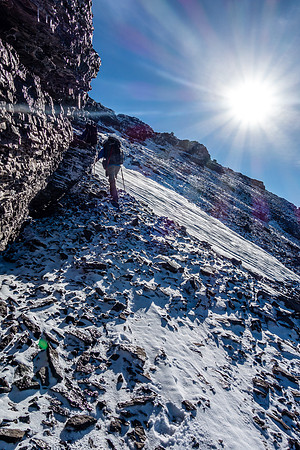 Heading up fresh snow / scree on Crown Peak. There was some route finding involved in keeping things moderate scrambling.