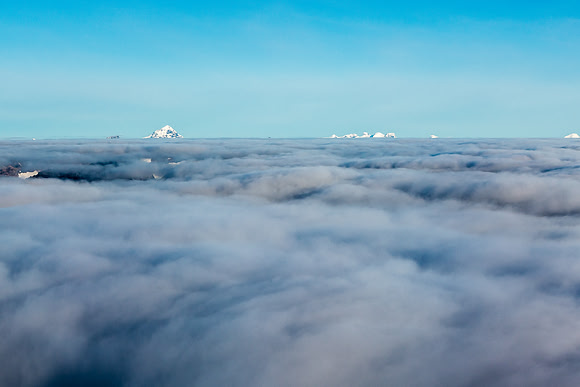 Forbes and the Lyells are the only summits above the clouds.