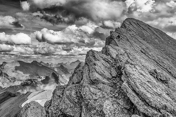 Descending the aesthetic NW summit ridge of Devon Mountain.