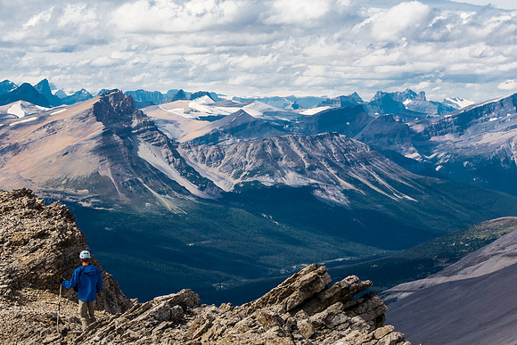 Ben descends the NW ridge. Conical, Porcupine and Noyes visible beyond.