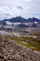 Ben comes up the lower scree slog on Devon's northwest ridge with Mosquito and Ramp in the distance.