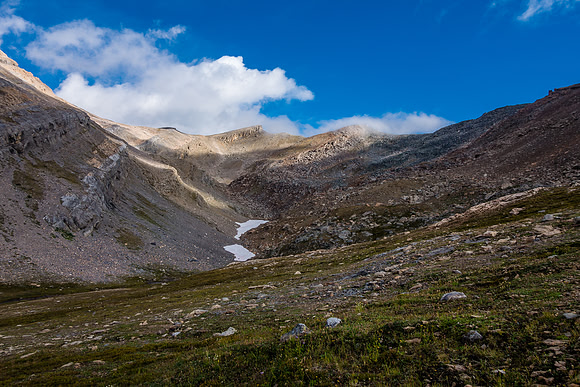 Looking ahead to the col area. Sonny went to climbers left but the regular route is to the right, up the larger rocks / boulders.