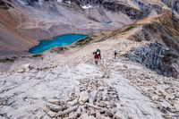 [Looking back at Steven and Eric ascending the sw ridge with the bivy site and lake far below already.