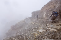 Scrambling down the chossy ridge.