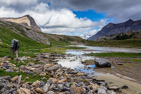 If the water was high the west side would be too wet to bother with over the trail.
