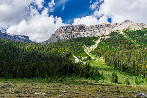Conical Peak rises over the valley and offers a possible shortcut route to Isabella Lake.