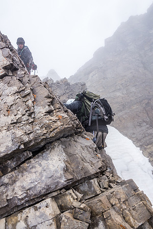 Scrambling down the chossy ridge.