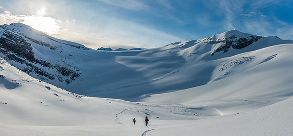 Ben and Steven follow me up the lower flank of Peyto's south face. Thompson looms on the left and Habel on the right.