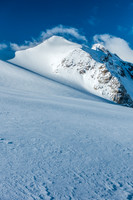 I think that Tilly (aka Little Trapper or Barrel Peak) is a peak in its own right. Small - but still a peak!