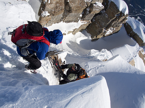 Negotiating the crux on the ridge.
