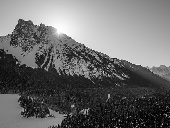 The sun coming up over Walcott Peak.