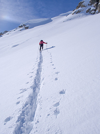 Bill breaks trail towards the summit ridge of Emerald Peak.