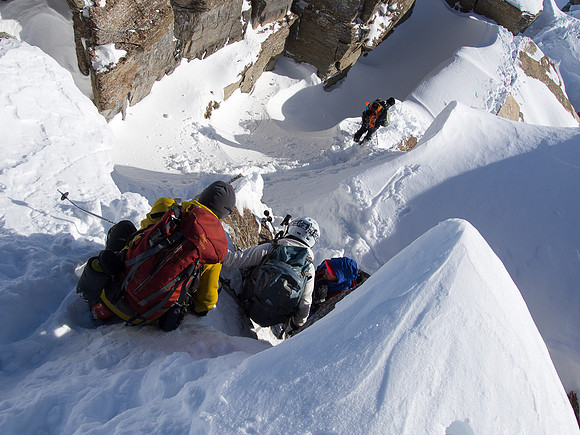 Negotiating the crux on the ridge.
