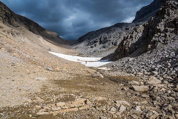 The two large patches of snow ahead make up a lot of the stream we approached along.