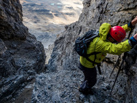 Carefully downclimbing the gully.
