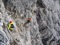 Things start getting a bit dicey as we exit the gully on climber's left and start negotiating up and around a steep, icy section of it on pretty loose and exposed terrain.