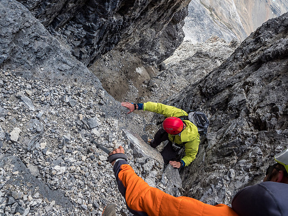 Carefully downclimbing the gully.