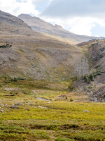 Looking across the valley at Phil who is dwarfed by the terrain.